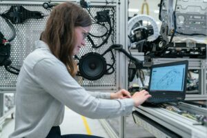 Automotive engineer working on vehicle repair